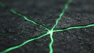 Material verde reparându-se singur, cu linii luminoase.